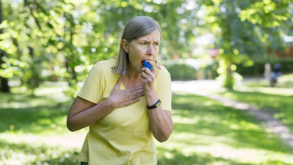 Woman Feeling Breathless During Hot Summer Day - DR TARUN BAID Blog